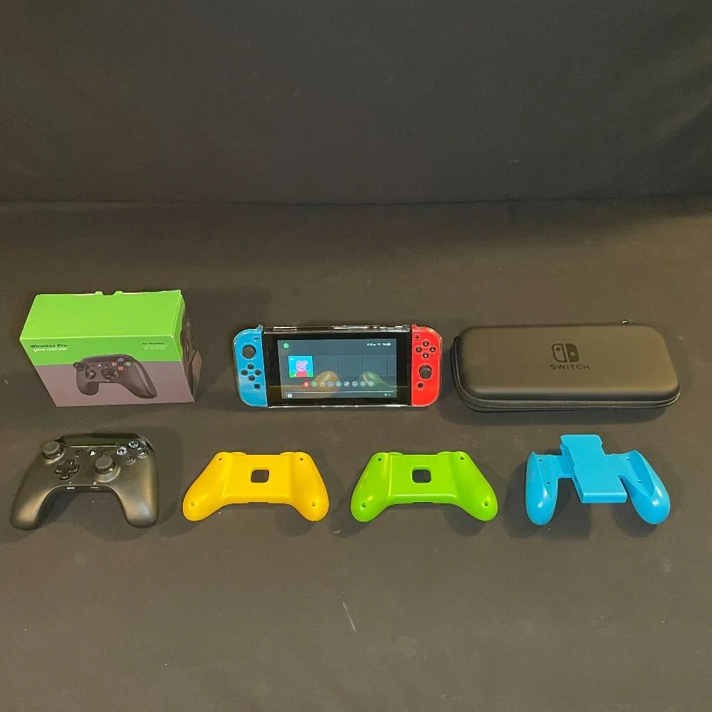 Nintendo Switch With Controllers And Accessories